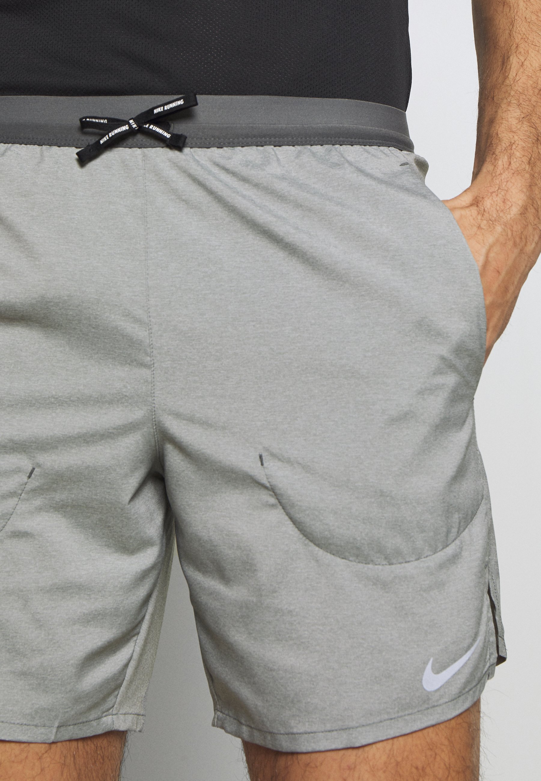 nike flex stride grey