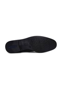 Zwarte rubberen zool met textuur voor grip, cirkelvormige patronen en een glad oppervlak; bevat het merkteken en modelgegevens.