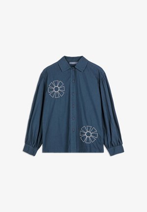 Dark blue long-sleeve button-up shirt with collar, gathered cuffs, and white embroidered geometric flower patterns on chest and lower side.