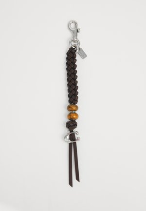 Brown braided leather keychain with two wooden beads, silver clasp, and silver letter "C" charm on a white background.