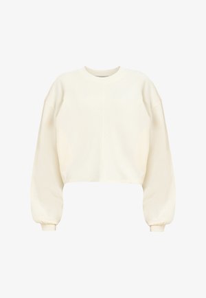 Sudadera recortada en crema claro, con mangas largas y abullonadas y puños de canalé. Fabricada en algodón suave con un diseño minimalista.