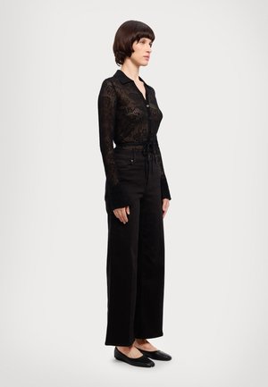 LE SLIM PALAZZO - Leveälahkeiset - black