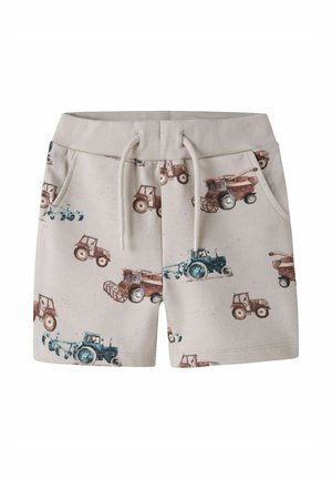 Kremfarvede babyshorts med blå og brune traktorer og mejetærskere, elastik i taljen og hvid snøre.