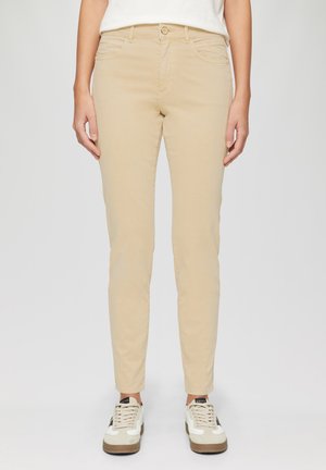 Beige, schmal geschnittene Hose aus Baumwollgemisch mit klassischem Five-Pocket-Design, gestickten Akzenten und einem Knopfverschluss an der Taille.