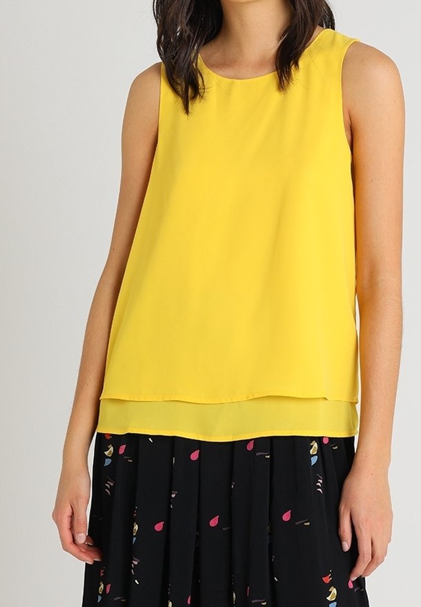 Geel mouwloos topje van lichtgewicht stof, met een losse pasvorm, een gelaagd ontwerp en een zachte textuur.