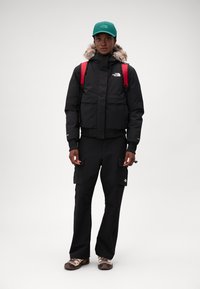 The North Face W ARCTIC BOMBER - Dunjacka - black