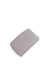 Gray leather wallet with a smooth texture, rounded edges, a zip closure, and embossed brand logo on the front. Compact and rectangular design.
