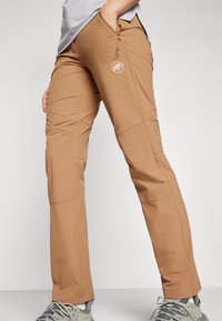 Mammut RUNBOLD PANTS WOMEN - Hlače za otvoreno - claystone