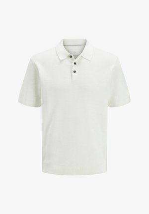 Valge lühikeste varrukatega tekstuurse kudumiga polo-särk, millel on kolm tumedat nuppu ning sooniline ääris ja mansetid, esitletud valgel taustal.