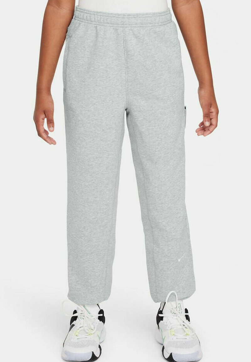 Pantalones de chándal grises de algodón con cintura elástica, dos bolsillos laterales y un pequeño logo en la pierna. Diseño de pierna recta.
