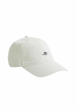 Weißes Baseballcap mit gebogenem Schirm und kleinem, auf der Vorderseite gesticktem Logo, das stilisierte Buchstaben und Sterne zeigt.