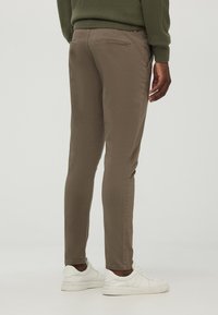 Terranova Chino - testa moro