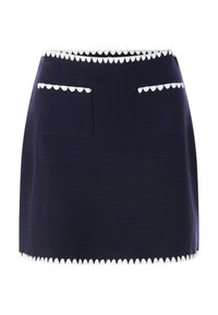 Tumesinine seelik, millel on keha järgiv lõige, valge lainelise äärega vöö- ja allääre piirkonnas ning kaks esitaskut lainelise ääristusega.