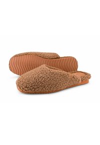 Brown fuzzy slippers with a textured, plush upper and rubber soles featuring horizontal grooves for grip. Open back design.