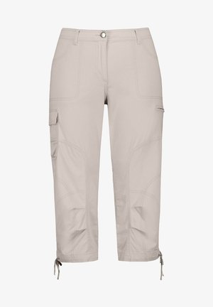 Beige cargo kalhoty vyrobené z lehké tkaniny, které mají několik kapes, šité vzory a nastavitelné šňůrky na manžetách.