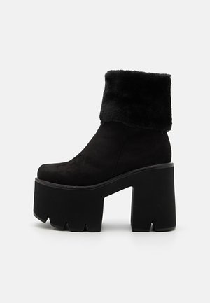 Stivaletti con tacco - black
