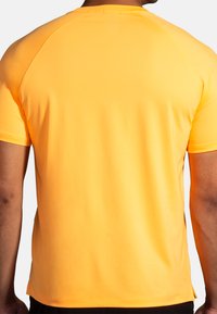 Brooks ATMOSPHERE SHORT SLEEVE 2.0 - Sports T-shirt - orange pop tempo print