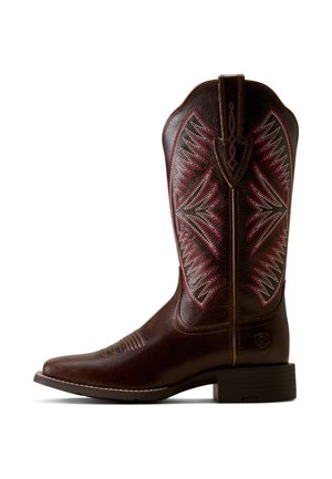 Brown leather cowboy boot with red and white decorative stitching, square toe, and low block heel, photographed from the side.