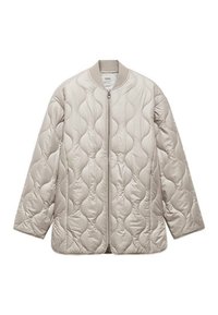 Quiltet, lyse beige overtøj med rund halsudskæring, frontlynlås og afslappet pasform. Har en bølget syning gennem hele.