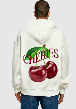 White hooded sweatshirt featuring large red cherries with green leaves and the word "CHERIES" in bold burgundy lettering on the back.