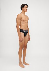 Calvin Klein Underwear HIP BRIEF INTENSE POWER 3 PACK  - Briefs - black/syrah/sand/brown