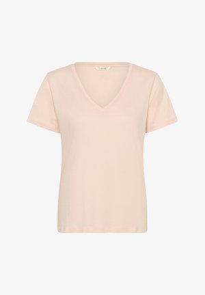 T-shirt en coton rose clair à manches courtes avec col en V, coupe simple et classique, et une étiquette "CREAM" à l'intérieur du col.