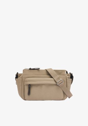 Beżowa torebka na ramię z wieloma kieszeniami zapinanymi na zamek i regulowanym paskiem. Wykonana z miękkiego materiału o gładkiej fakturze i minimalnej ilości elementów metalowych.