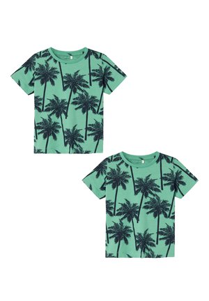 Green fabric t-shirt featuring a black palm tree print, short sleeves, and a round neckline. Suitable for casual wear.