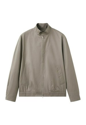 Svetlohnedá bunda na zips s stojatým golierom, dvoma bočnými vreckami, elastickým lemom a zapínaním na gombík pri krku.