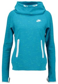 Teal Nike-hoodie med spräckligt mönster, hög krage med dragskor, två vertikala dragkedjefickor och tumhål på långa ärmar.