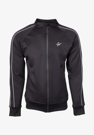 Zwarte zip-up jas van gladde stof, met witte zijkanten, een hoge kraag en ritszakken. Versierd met een logo op de borst.