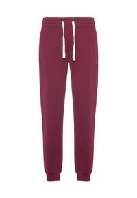 Pantaloni della tuta color bordeaux realizzati in morbido misto cotone, con vita regolabile tramite coulisse, polsini a coste e un piccolo logo dorato di lato.