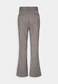 Gray flared pants in a textured fabric with a subtle houndstooth pattern, featuring a mid-rise waist and back pockets.