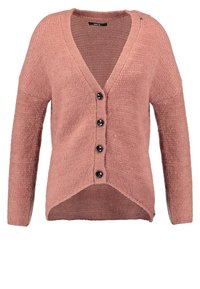 Lyserød strikket cardigan med V-hals, lange ærmer og fem sorte knapper. Har en lidt længere ryg og tekstureret stof.