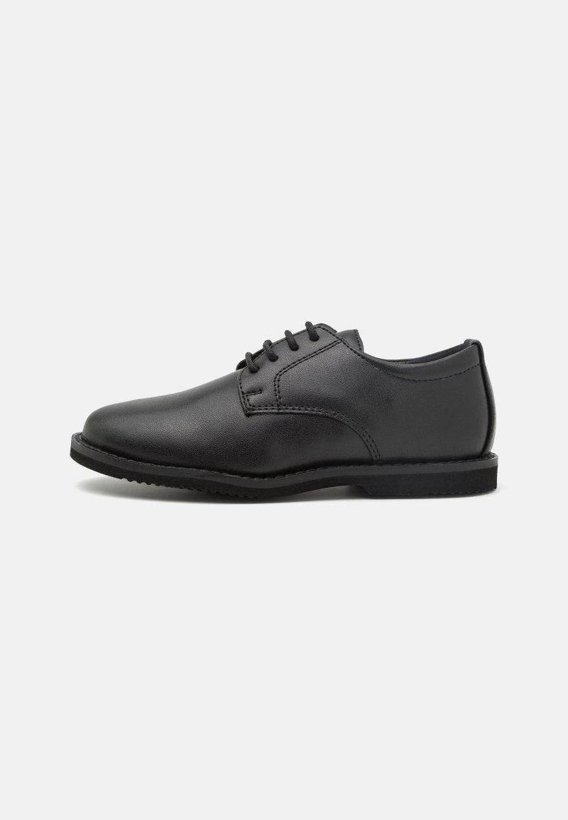 Chaussure habillée noire en cuir à lacets avec bout arrondi et petit talon, vue de profil sur fond blanc.