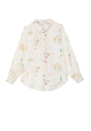 Λευκό πουκάμισο με μακριά μανίκια και κουμπιά, με πολύχρωμα σχέδια θεματικά καουμπόι, συμπεριλαμβανομένων μπότες, κάκτους, πετάλια και αστέρια.