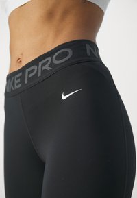 Nike Performance Leggingek - black/anthracite/white