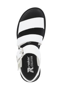 White leather sandals with three adjustable straps, a silver buckle, and a black cushioned sole. Brand logo visible on the footbed.