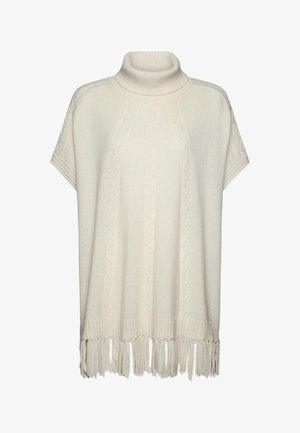 Poncho blanc tricoté avec un col montant, présentant des motifs à torsades texturés et un ourlet à franges. Tissu doux et coupe décontractée.