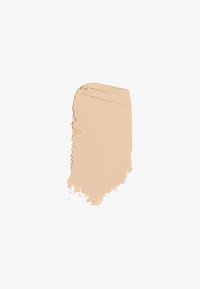 Beżowy kremowy swatch makijażu o gładkiej teksturze i matowym wykończeniu, wykazujący jednolity kolor i lekko kanciasty kształt.