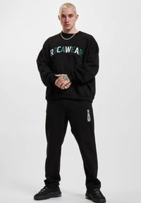 Rocawear JOGGING - Joggebukse - black