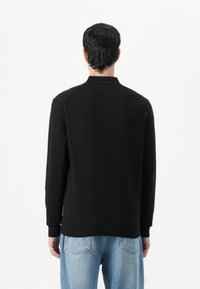 Tommy Hilfiger PIMA - T-shirt à manches longues - black