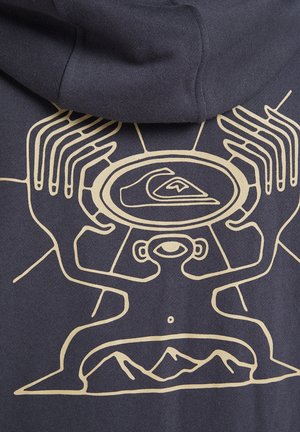 Navy hoodie featuring a large beige graphic design of hands cradling a circular wave logo, with mountains below and stylized figures.