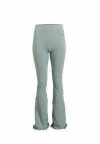 Mint green ribbed flared pants with a high waistband and ruffled hem detailing. Made of stretchy, textured fabric for comfort.
