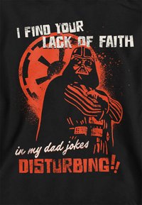 Black t-shirt featuring a stylized red graphic of a character with a helmet and armor, accompanied by white text, "I FIND YOUR LACK OF FAITH in my dad jokes DISTURBING!!"