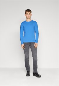 Tommy Hilfiger STRETCH SLIM FIT - Top s dlhým rukávom - blue spell