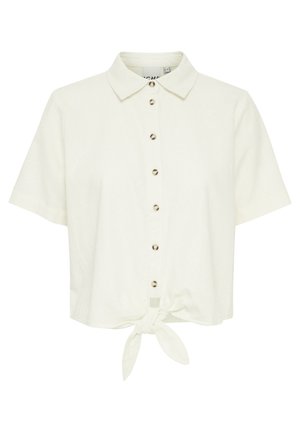 Kremena majica kratkih rukava od lagane tkanine, s ovratnikom, prednjim kopčanjem na dugmad i čvorom na rubu.