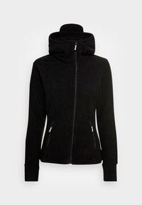 Zwarte fleecjas met een hoge kraag, een rits aan de voorkant en twee ritssluitingen aan de zijkant. Bevat lange mouwen en een gladde textuur.