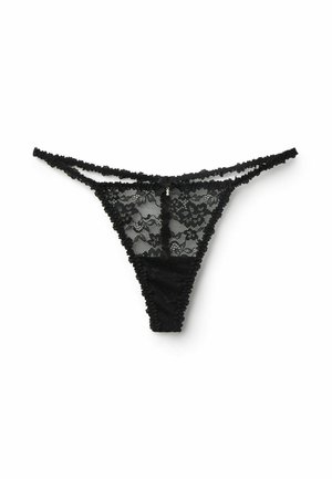 String en dentelle noire avec motif floral, fine taille double, petit nœud et breloque décorative au centre devant.