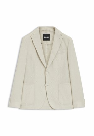 Męska marynarka w jasnobeżowym kolorze z teksturą, z klapą z wycięciem, dwoma naszywanymi kieszeniami z przodu, dwoma guzikami oraz czarną metką BOSS wewnątrz kołnierza.